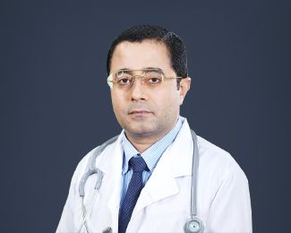 Dr. Manuel John